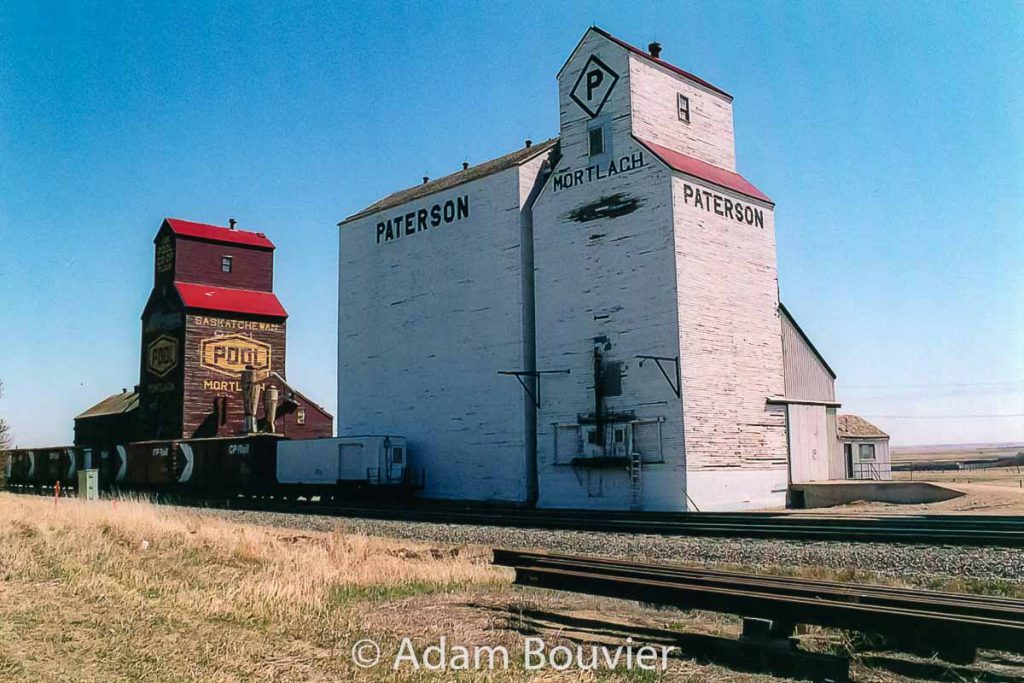 Mortlach grain elevators, May 2005. Contributed by Adam Bouvier.