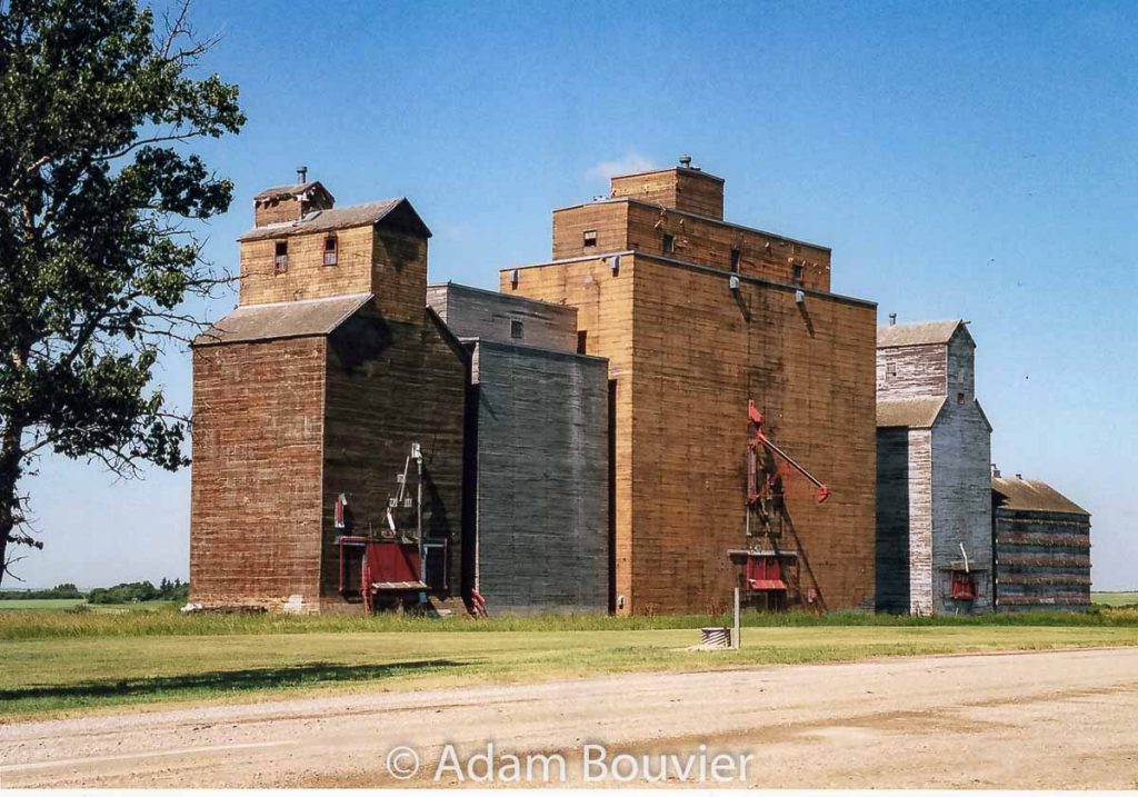 Hanley, SK grain elevators, July 2006. Contributed by Adam Bouvier.