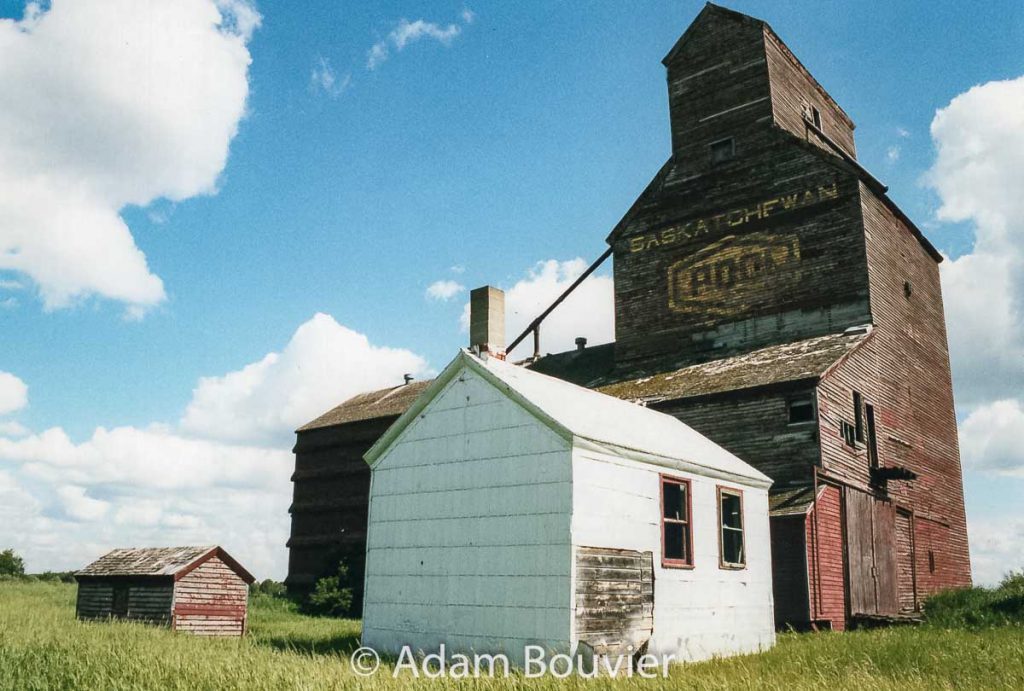 Office and grain elevator in Tonkin SK, June 2017. Contributed by Adam Bouvier.