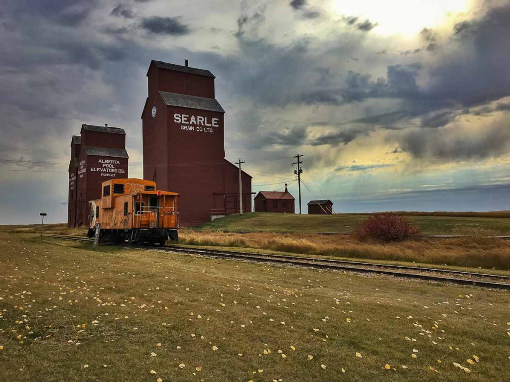 Rowley, AB grain elevators and caboose. Contributed by Jenn Tanaka.