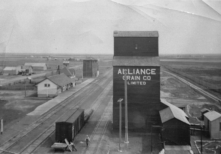 Alliance Grain elevator and train station in Avonlea, SK, 1912.