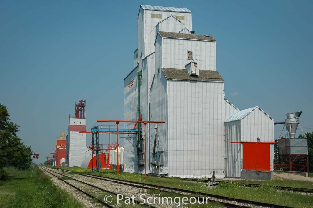 Grain elevators in Lake Lenore, SK, June 2006. Contributed by Pat Scrimgeour.