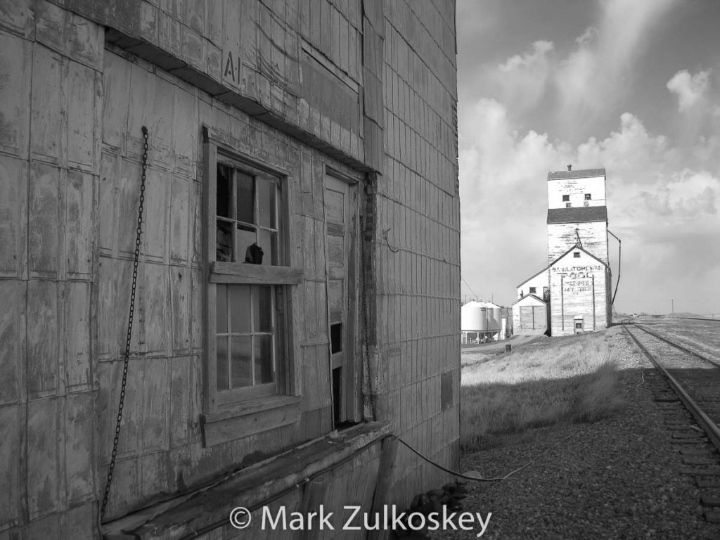 Grain elevators in Battrum, SK. Contributed by Mark Zulkoskey.