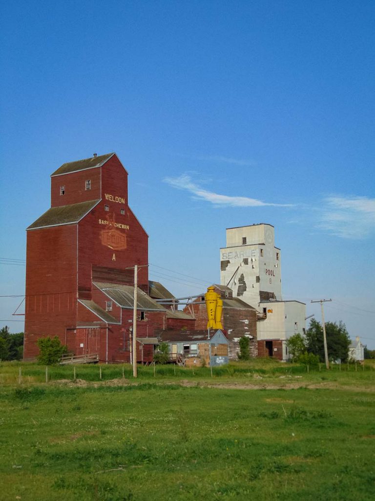 Grain elevators in Weldon, SK. Copyright by BW Bandy.