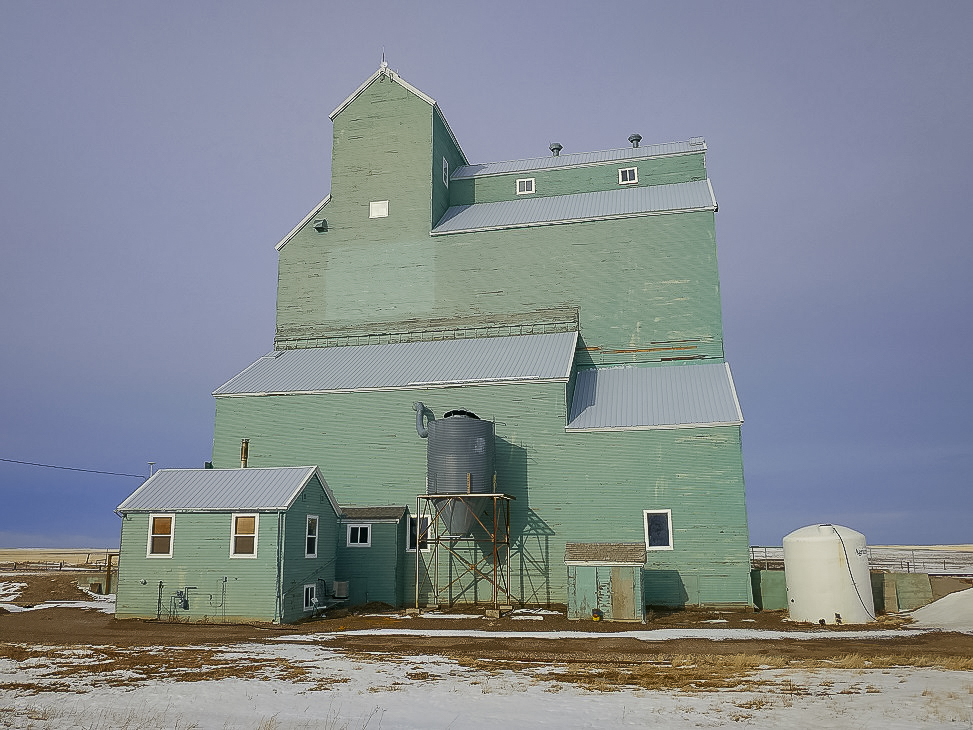 Ex Alberta Wheat Pool grain elevator in Wrentham, AB, Jan 2018. Copyright by Michael Truman.