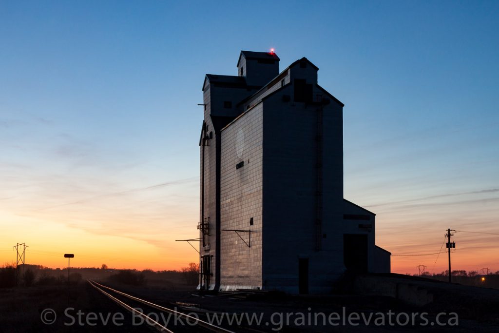 Cromer grain elevator at sunset, Apr 2016. Contributed by Steve Boyko.