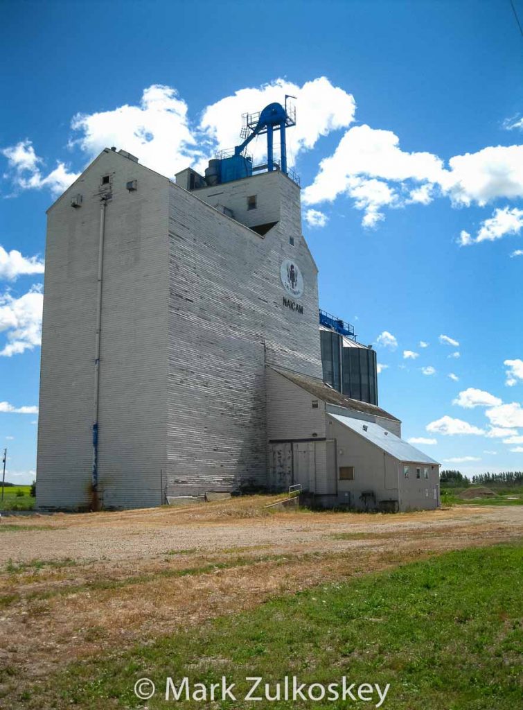 Former UGG grain elevator in Naicam, SK, Aug 2009. Contributed by Mark Zulkoskey.