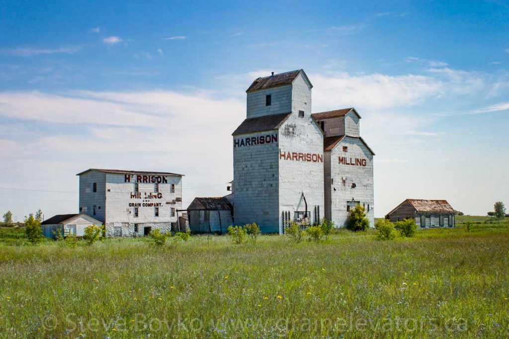 Harrison Mill and grain elevator in Holmfield, MB, Aug 2014. Contributed by Steve Boyko.