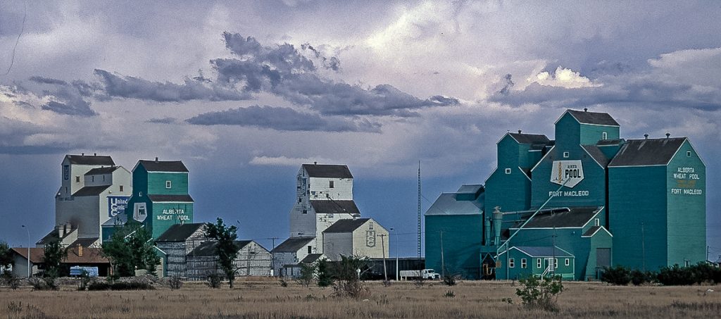 Elevator row in Fort MacLeod, AB, 1992. Copyright by Gary Rich.