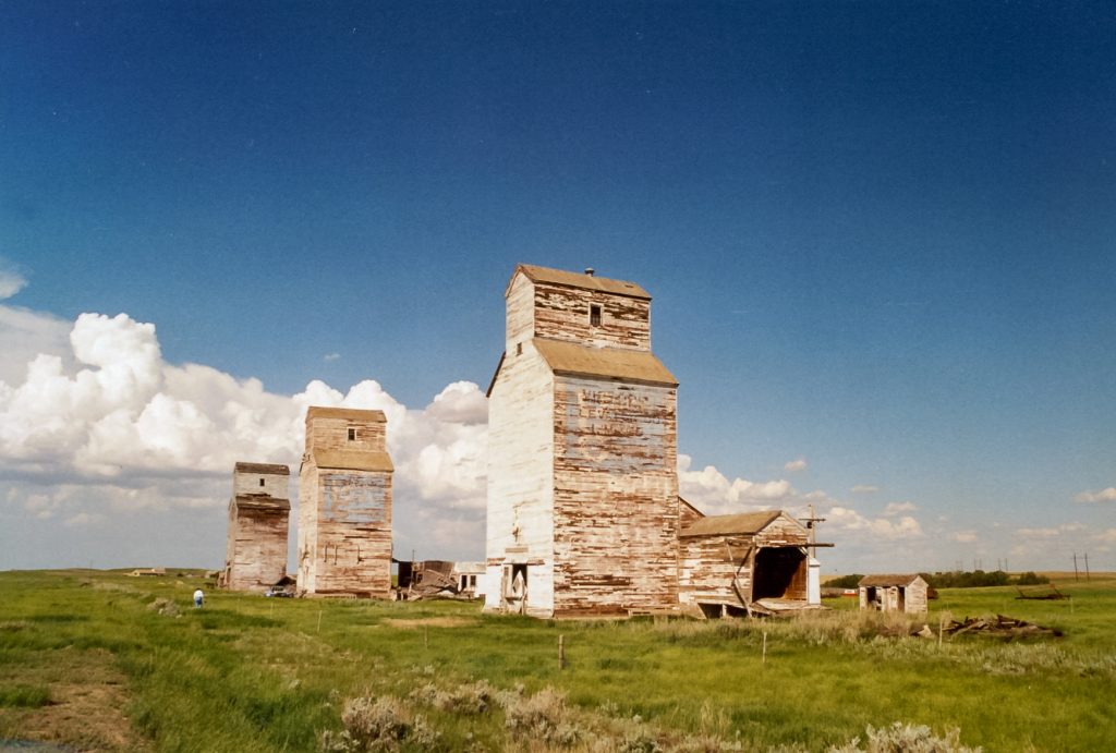 Grain elevators in Verlo, SK, June 2002. Copyright by Robert Boyd.