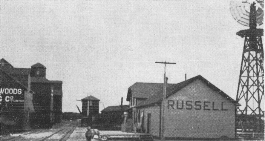 CPR train station and grain elevators in Russell, MB, early 1900s