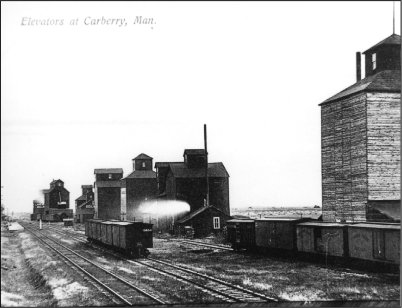 Grain elevators in Carberry, MB circa 1900.