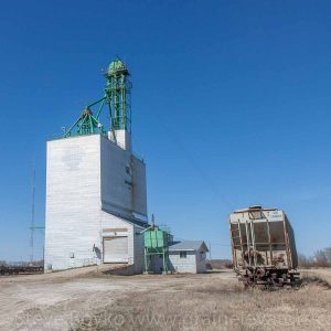 Grain elevator and stranded grain car in Solsgirth, MB, Apr 2016. Contributed by Steve Boyko.