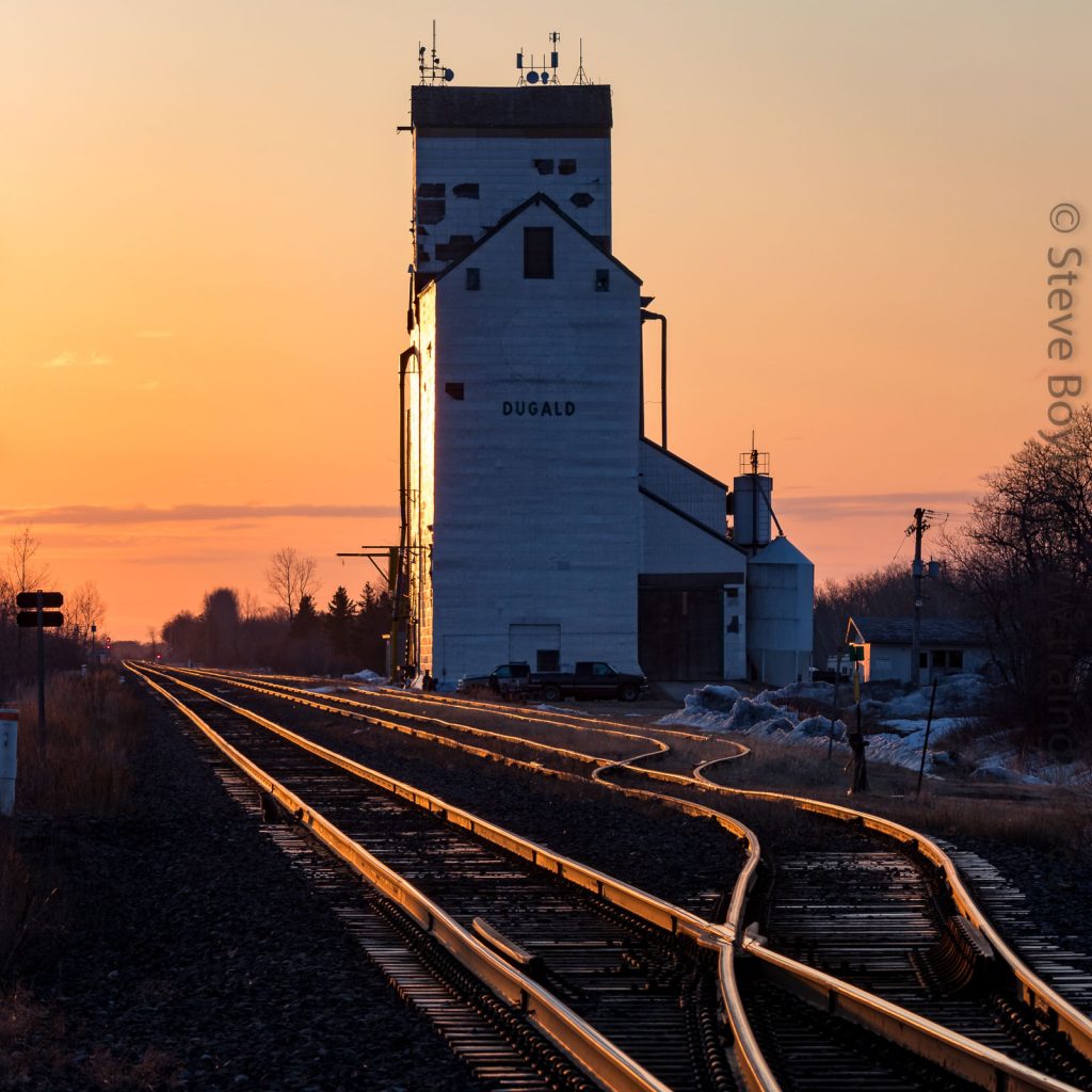 Dugald, MB grain elevator at sunrise, Apr 2018. Contributed by Steve Boyko.
