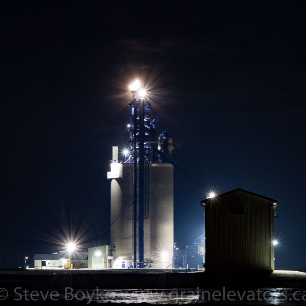 The Ste. Agathe grain elevator at night, Feb 2017. Contributed by Steve Boyko.