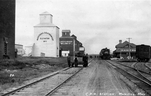 Manitou, MB grain elevators and station, circa 1910.