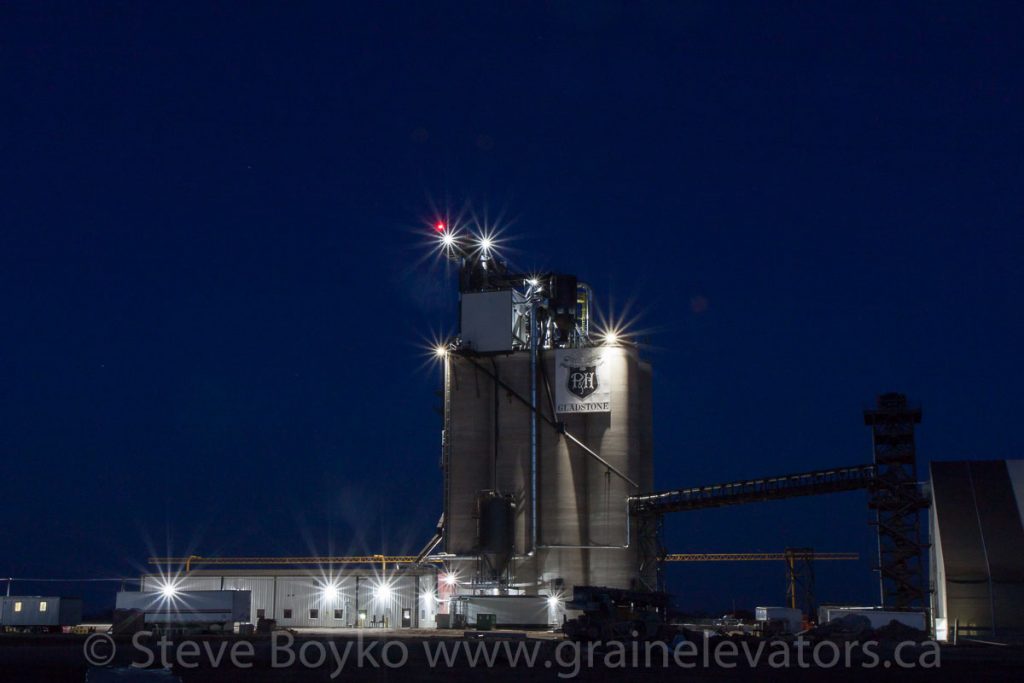 Parrish and Heimbecker grain elevator at night at Gladstone, MB, Apr 2016. Contributed by Steve Boyko.