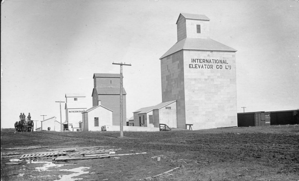 Grain elevators in Ogema, SK, date unknown.