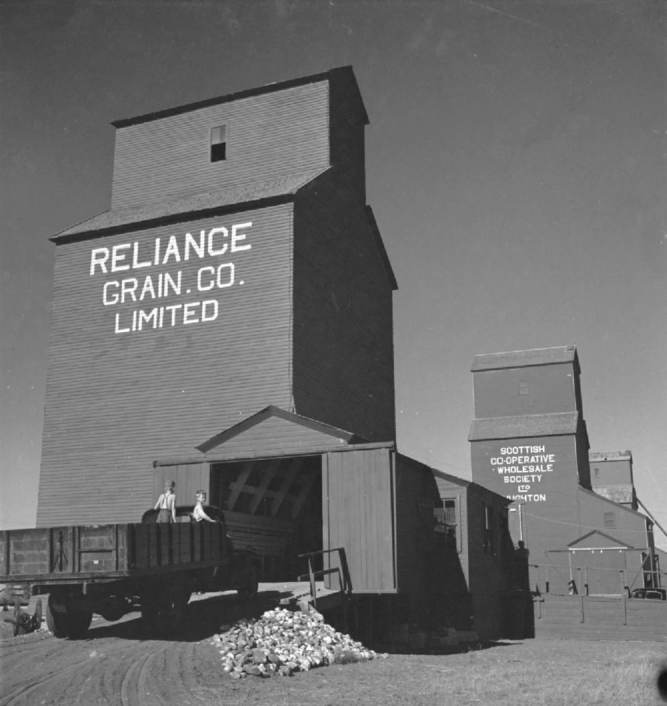 Grain elevators in Stoughton, SK, 1950.