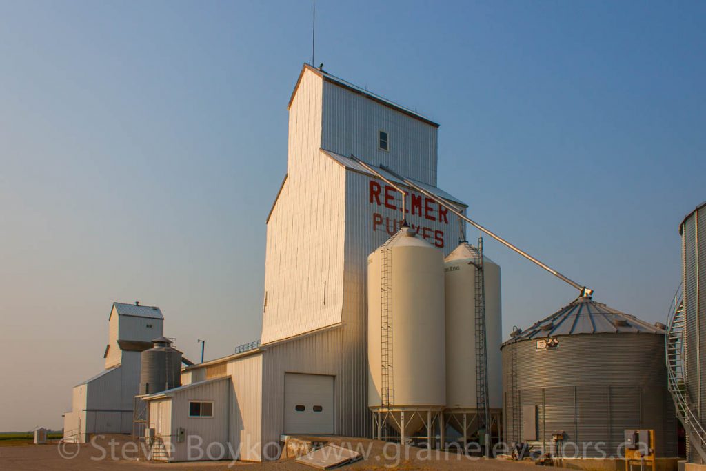 The Reimer grain elevators in Purves, MB, July 2014. Contributed by Steve Boyko.