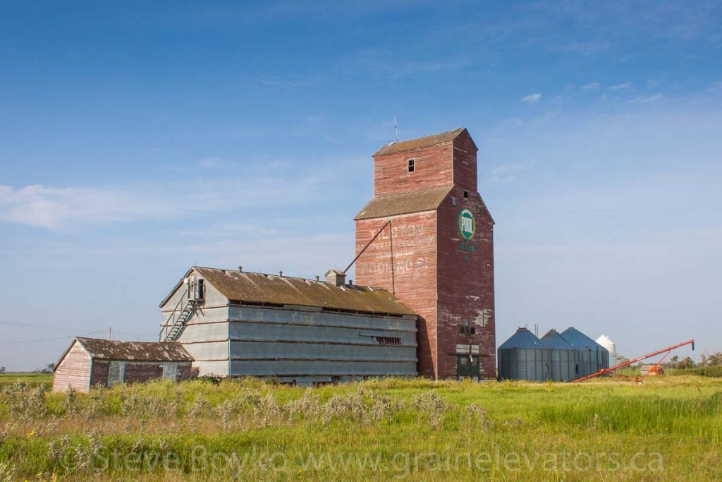 The former Manitoba Pool grain elevator stands proudly in Tilston, Manitoba, Canada. Aug 2014.
