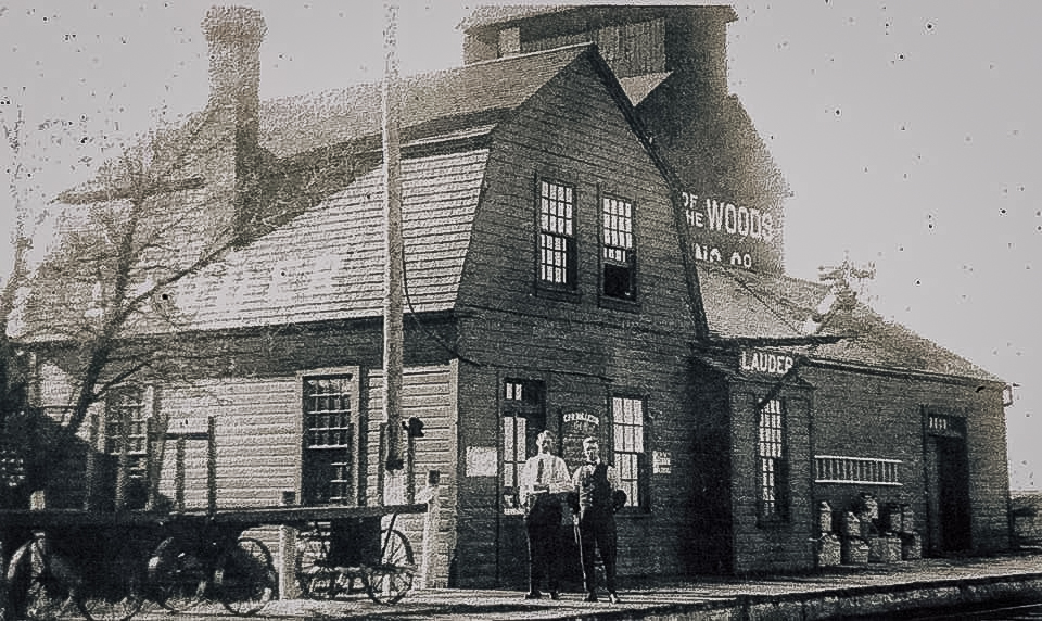 Lauder train station with Lake of the Woods grain elevator, circa 1919