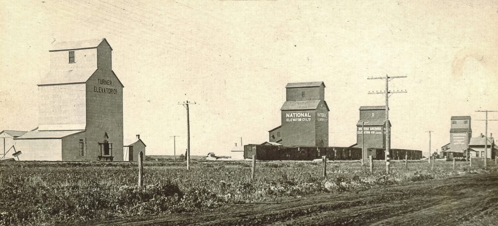 Grain elevators in Kinistino, SK, date unknown.
