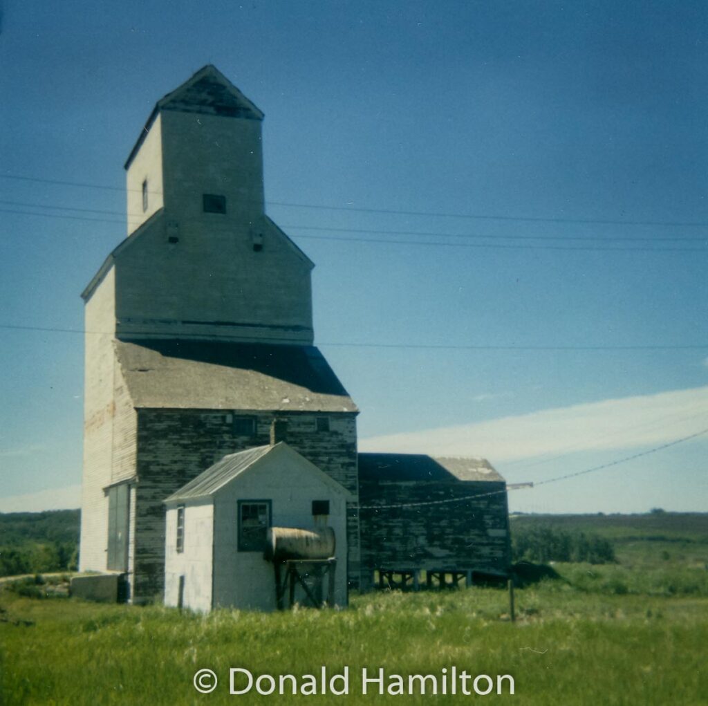 Grain elevator in Birdtail, MB, June 1991. Contributed by Donald Hamilton.