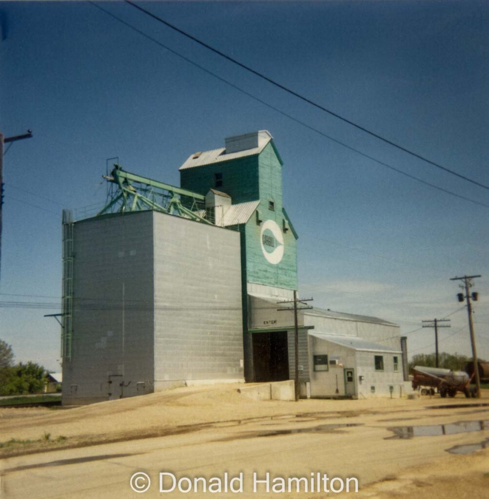 Cargill grain elevator and annex in Sydney, MB, April 1991. Copyright by Donald Hamilton.