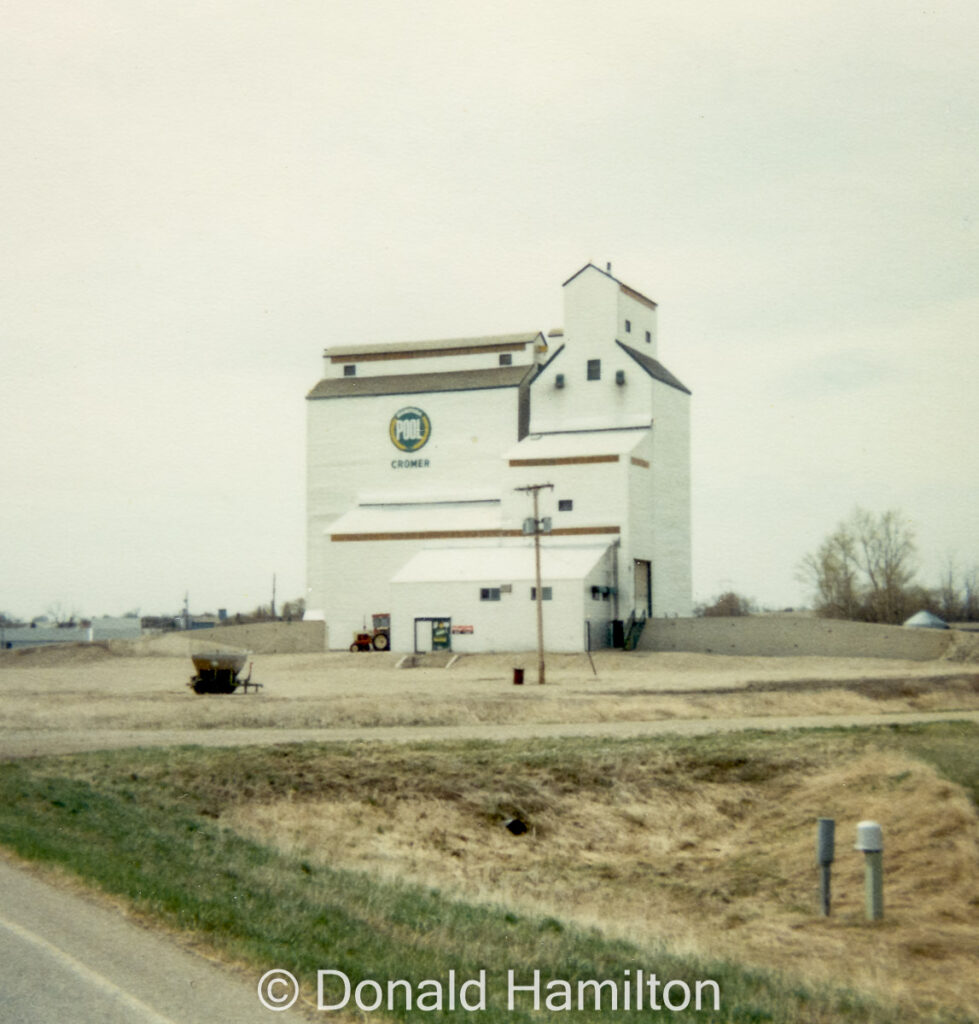 Manitoba Pool grain elevator in Cromer, July 1989. Copyright by Donald Hamilton