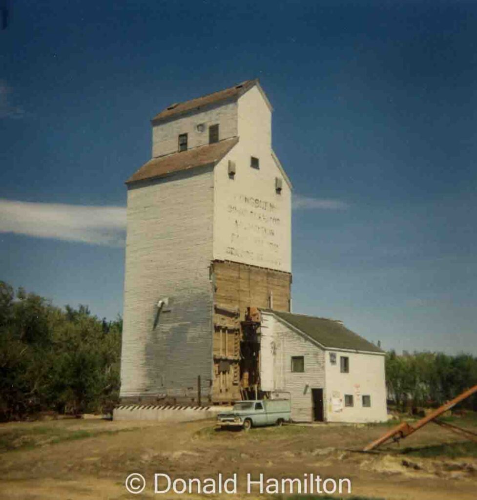 Longburn, MB grain elevator - possibly in McDonald. Copyright by Donald Hamilton.