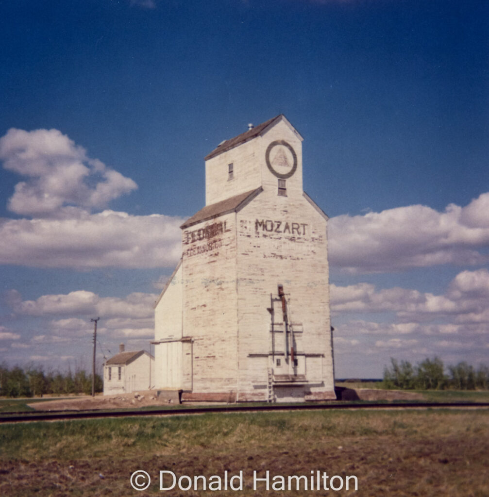 Former Federal grain elevator in Mozart, SK, 1990. Copyright by Donald Hamilton.