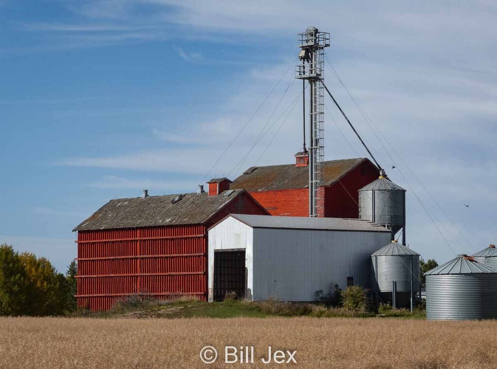 Grain elevator annexes SW of Vegreville, AB, Oct 2014. Contributed by Bill Jex.