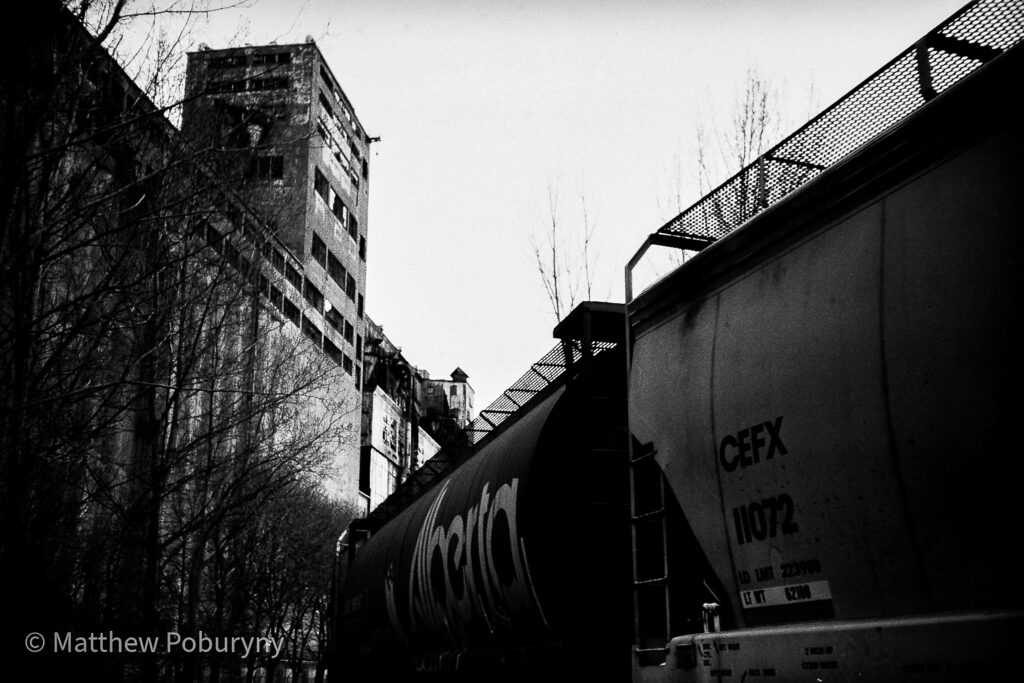 Train passing Montreal Silo 5. Contributed by Matthew Poburyny.