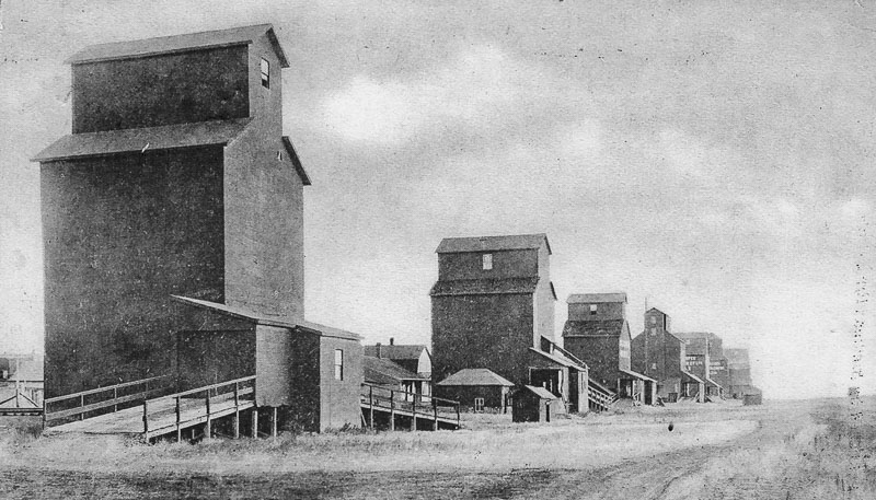 Grain elevators in Sintaluta, SK, circa 1910