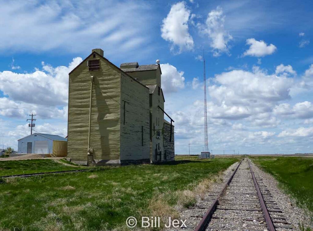 Grain elevator and tracks in Skiff, AB, May 2013. Contributed by Bill Jex.