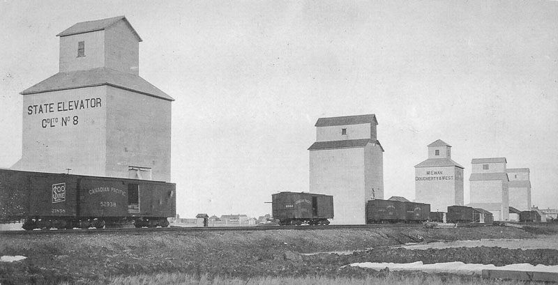 Grain elevators and boxcars in Swift Current, SK, circa 1910
