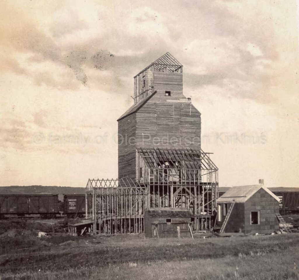 Probably Cranmer, MB grain elevator, under construction, 1927. Contributed by the family of Ole Pedersen Kirkhus.