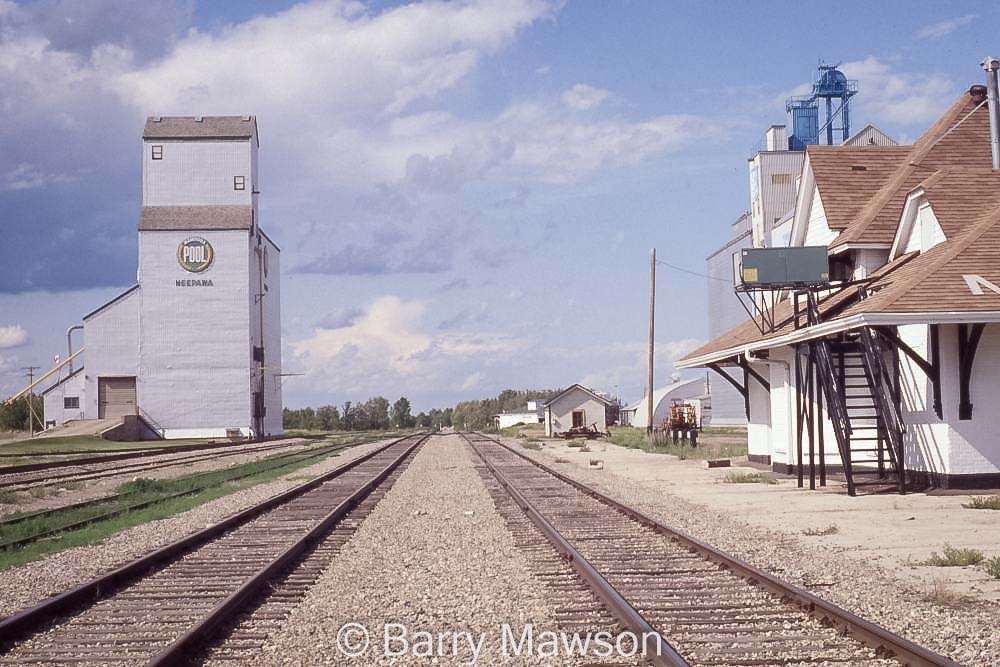 Pool elevator and train station, Neepawa, MB, 1991. Contributed by Barry Mawson.