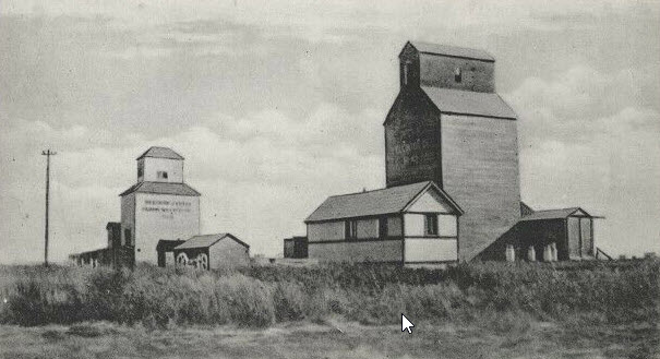 Wauchope, SK grain elevators, 1910, from postcard