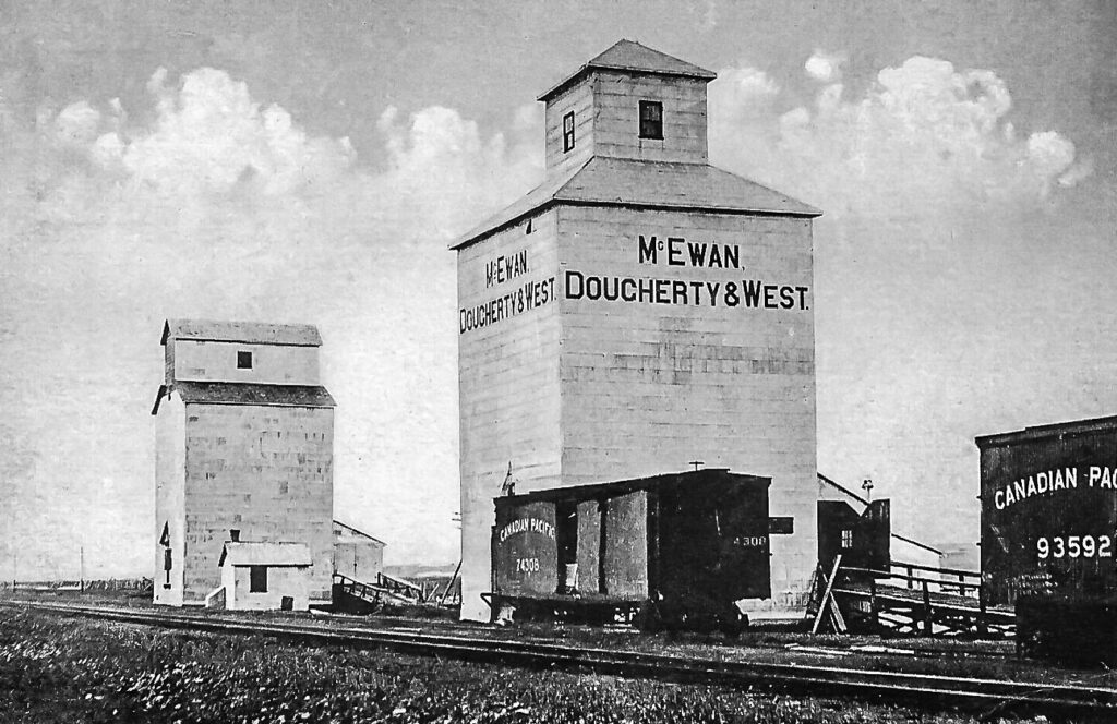 McEwan, Dougherty & West grain elevator, Swift Current, SK, postcard, date unknown
