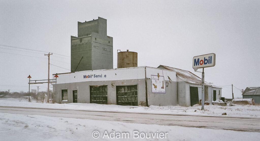 Abandoned gas station and grain elevator.