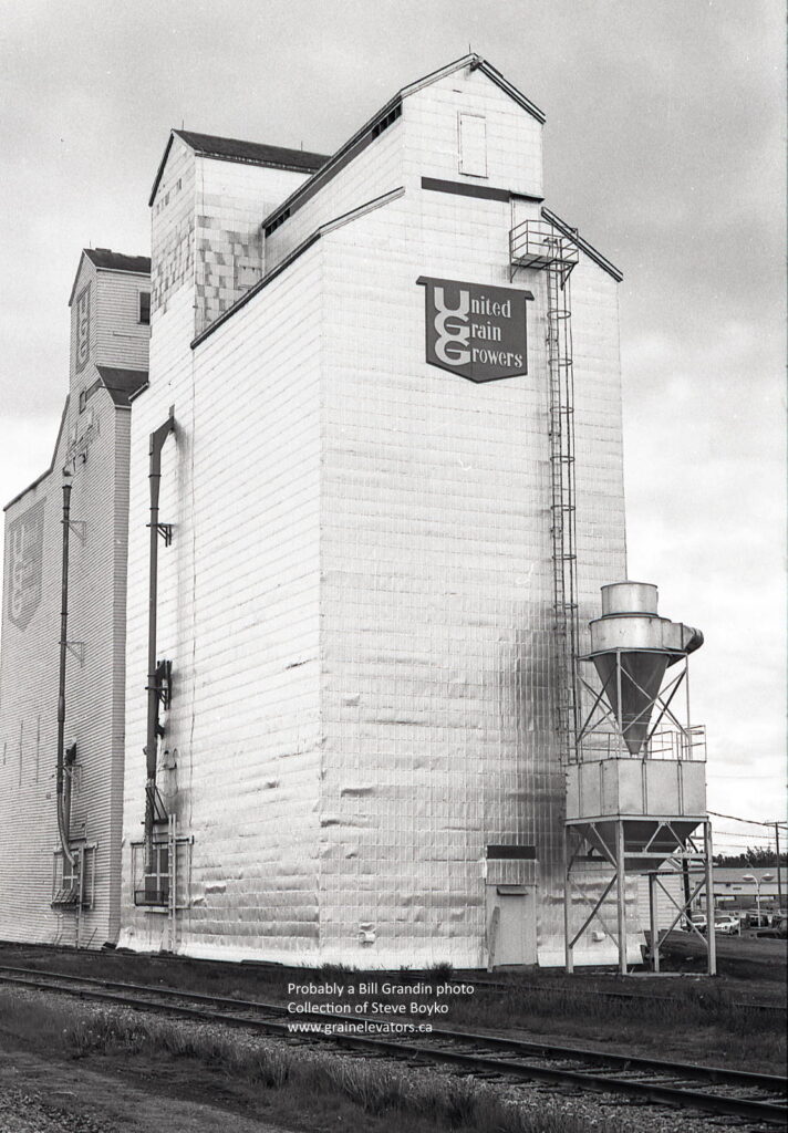 Pair of wooden grain elevators