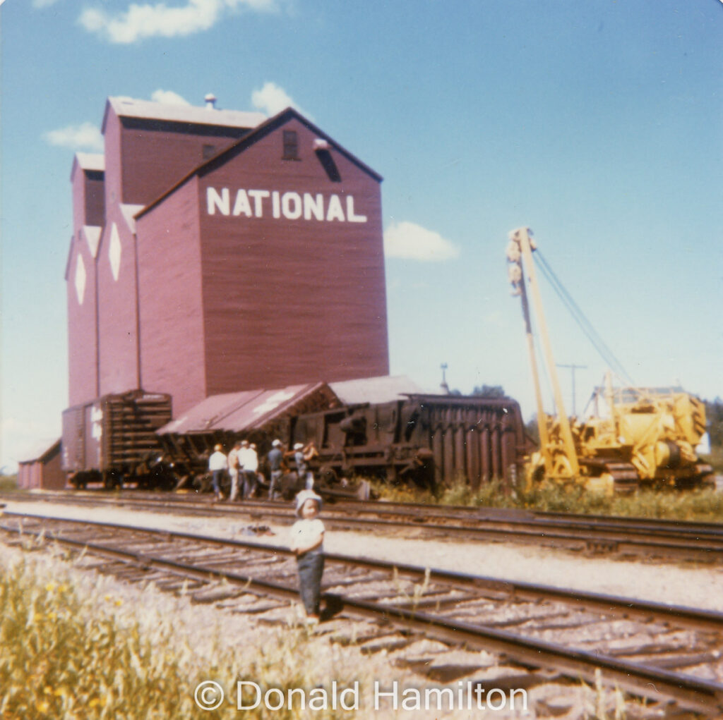 Derailed boxcars at grain elevator