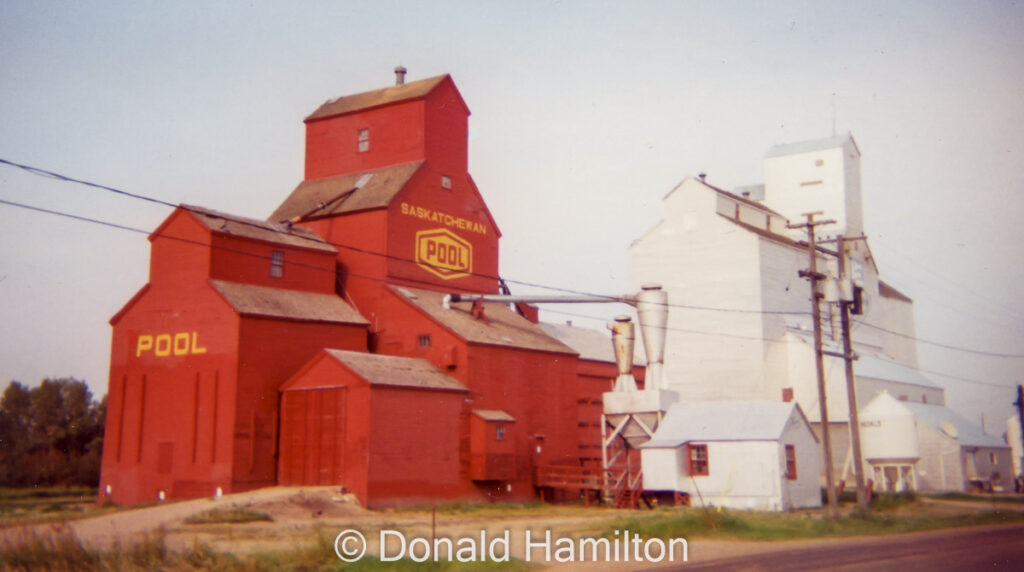 UGG & Saskatchewan Wheat Pool "A" grain elevators in Birch Hills, SK, August 1994.