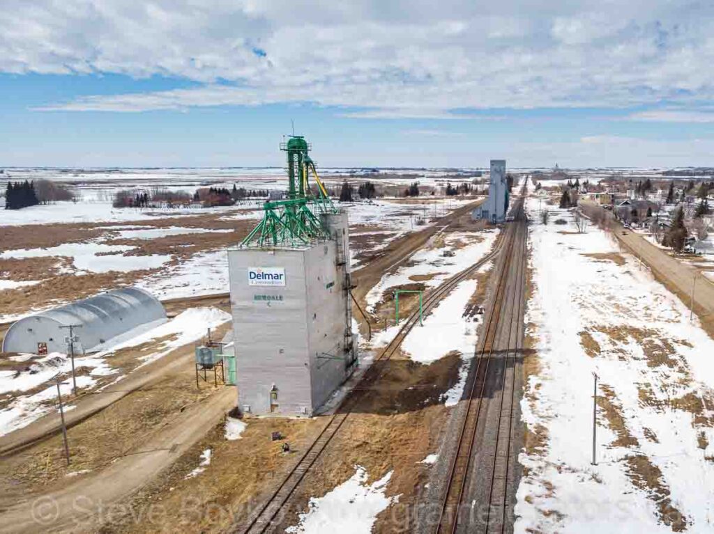 Two grain elevators in Newdale, MB, March 2022.