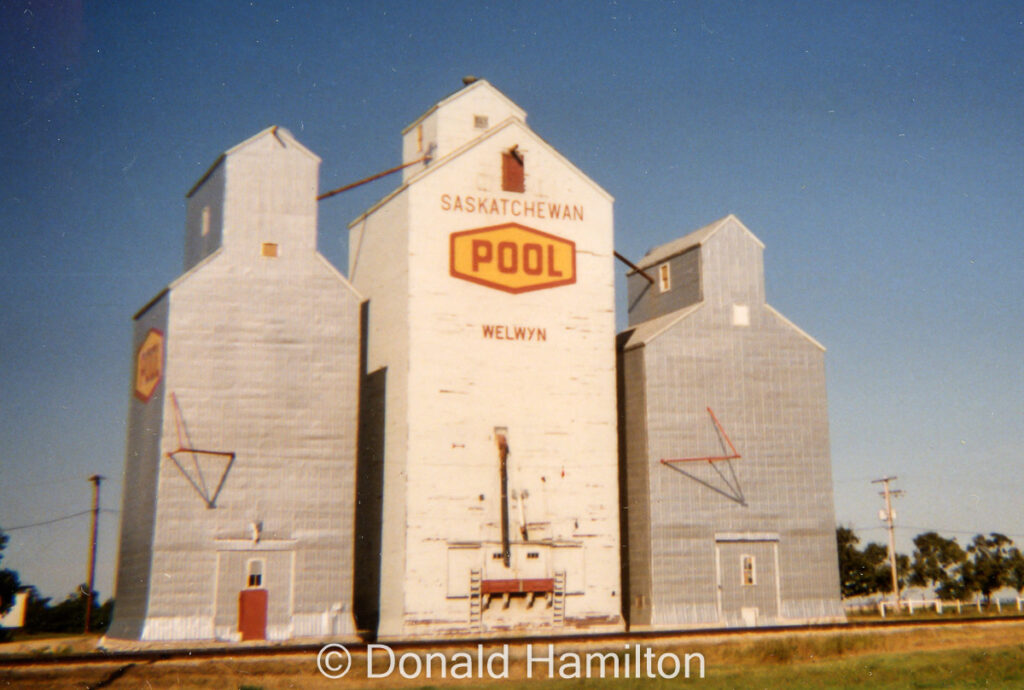 Collection of grain elevators in Welwyn, Saskatchewan, September 1995.