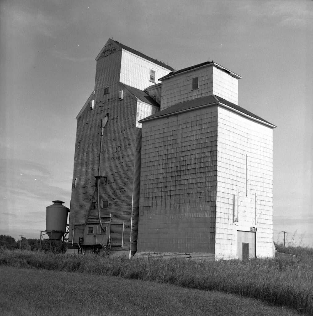 Manitoba Pool grain elevator in Crandall, MB, August 1982.