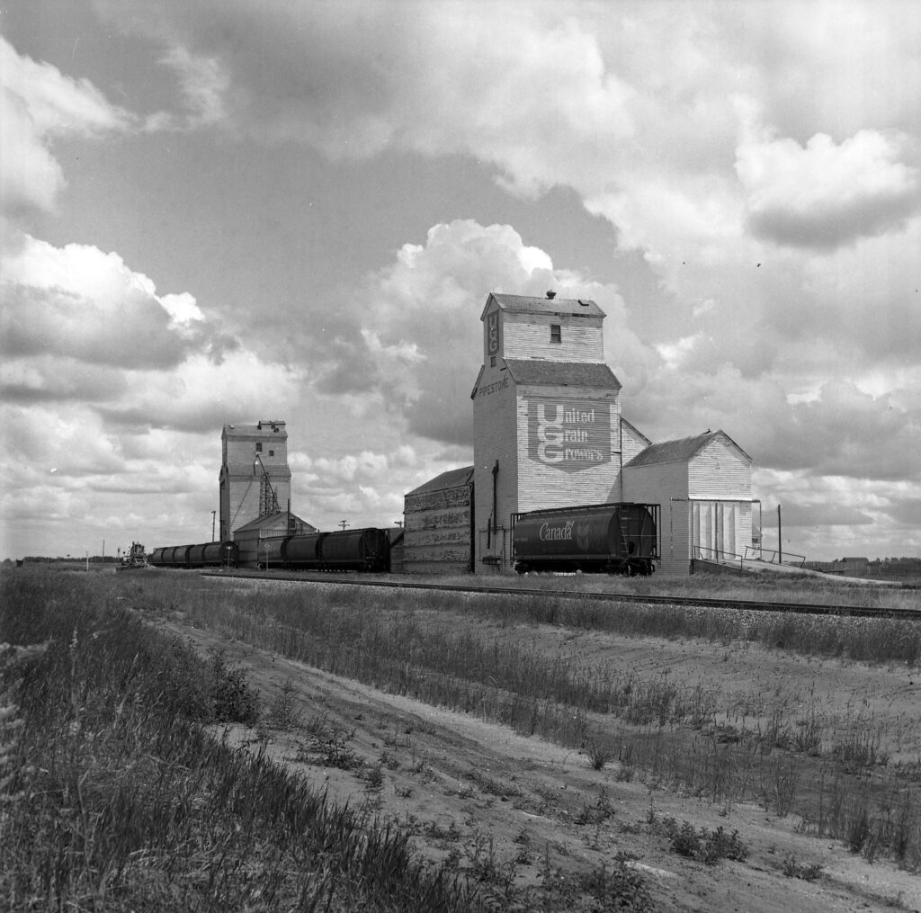 Grain elevators in Pipestone, MB, July 1986.