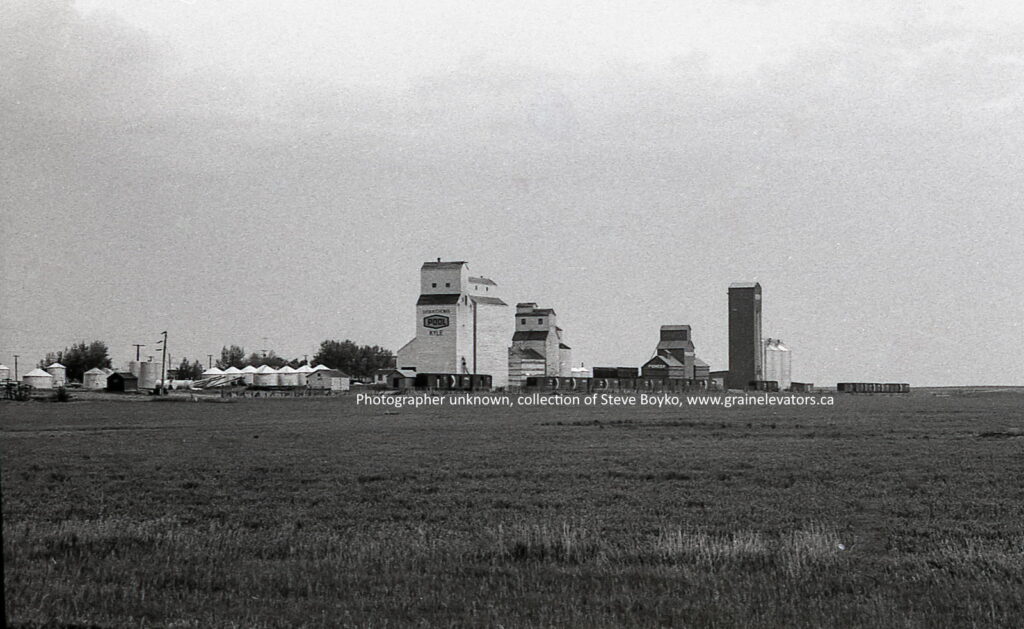 Grain elevators in Kyle, SK, June 1980.